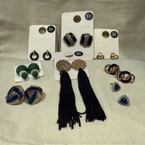 9 pairs of earrings from various brands